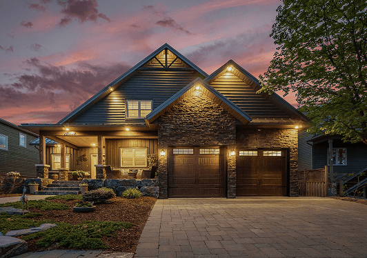 Contemporary waterfront residence at 11 Baycrest Drive with stone and wood facade